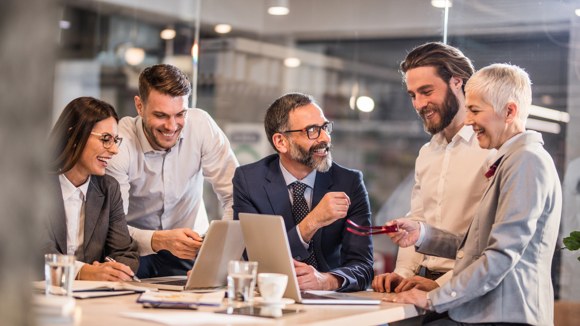 A diverse legal team engaged in a thoughtful discussion, collaborating on a strategy to navigate complex challenges and drive meaningful progress.